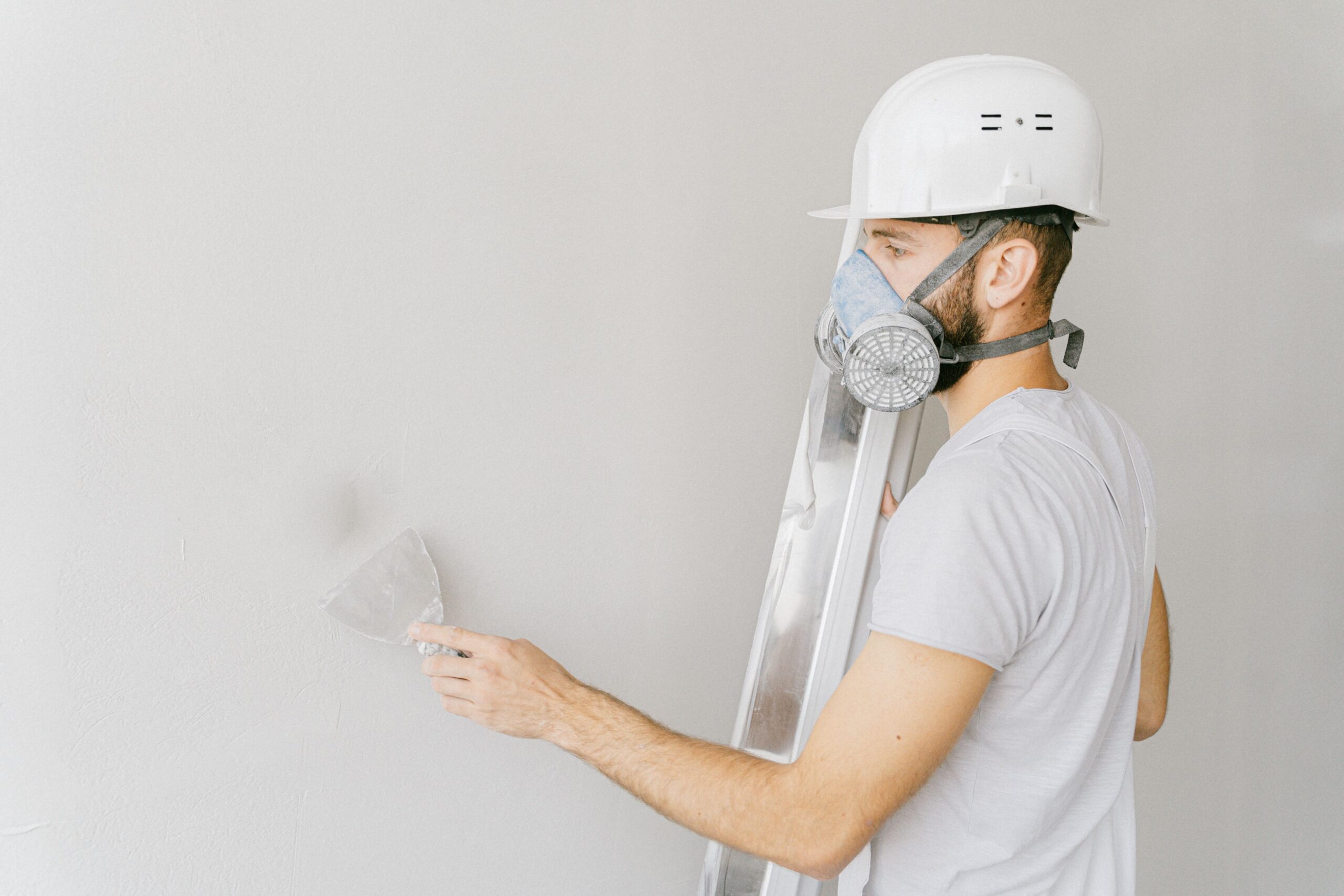 how to fix holes in your wall